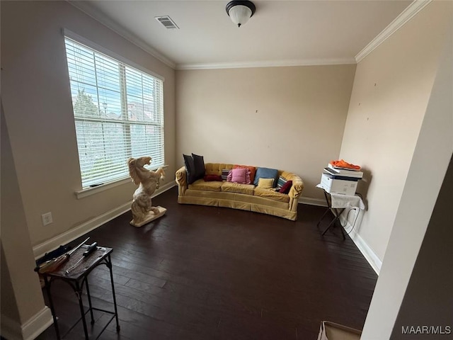 living room featuring healthy amount of natural light, dark wood-style floors, ornamental molding, and baseboards