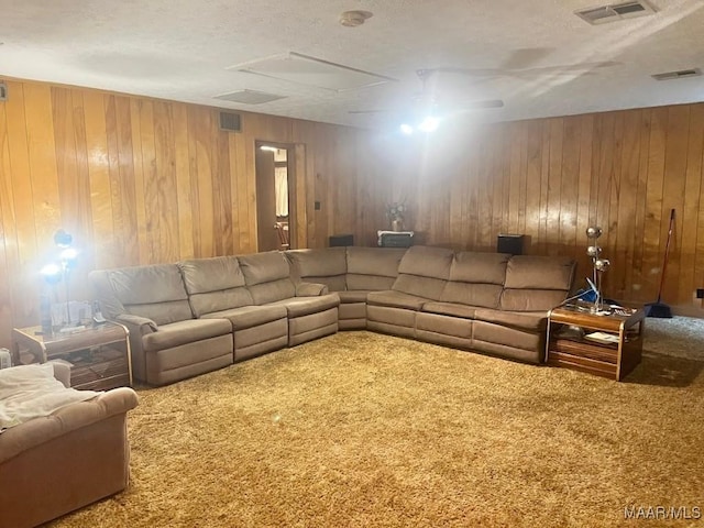 3600 Hunting Creek Rd, Montgomery, AL 36116 - carpeted living area with wooden walls and a textured ceiling