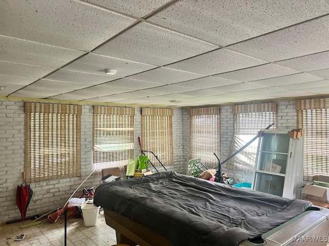 3600 Hunting Creek Rd, Montgomery, AL 36116 - bedroom featuring a paneled ceiling and brick wall