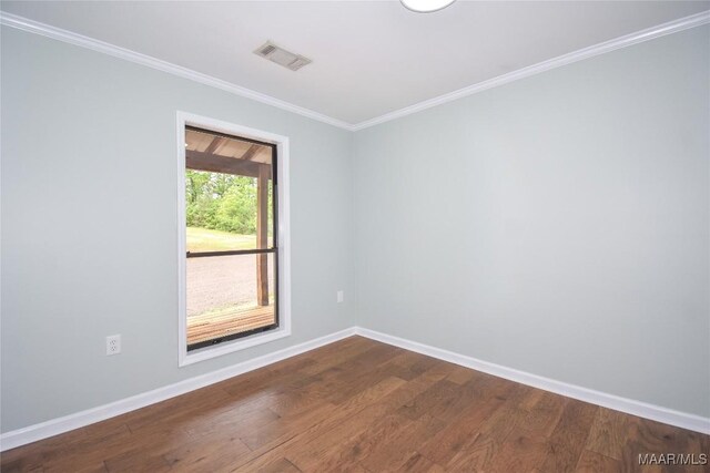6790 Upper River Rd, Tallassee, AL 36078 - unfurnished room with ornamental molding, dark wood-type flooring, and baseboards