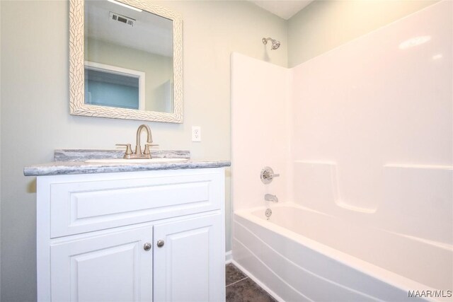 6790 Upper River Rd, Tallassee, AL 36078 - bathroom featuring shower / washtub combination, vanity, and tile patterned floors