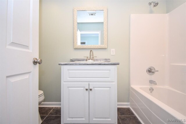 6790 Upper River Rd, Tallassee, AL 36078 - full bath with baseboards, vanity, toilet, and tile patterned flooring