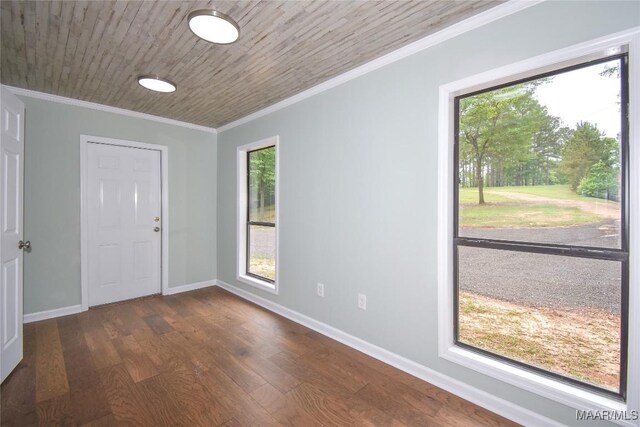 6790 Upper River Rd, Tallassee, AL 36078 - foyer entrance with dark wood-type flooring, baseboards, and crown molding