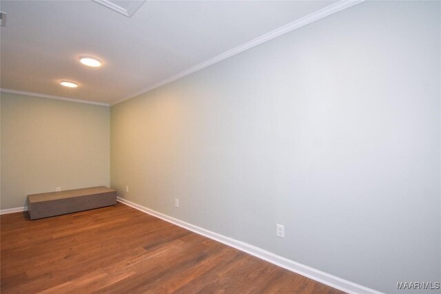 6790 Upper River Rd, Tallassee, AL 36078 - unfurnished room with baseboards, dark wood-type flooring, and ornamental molding
