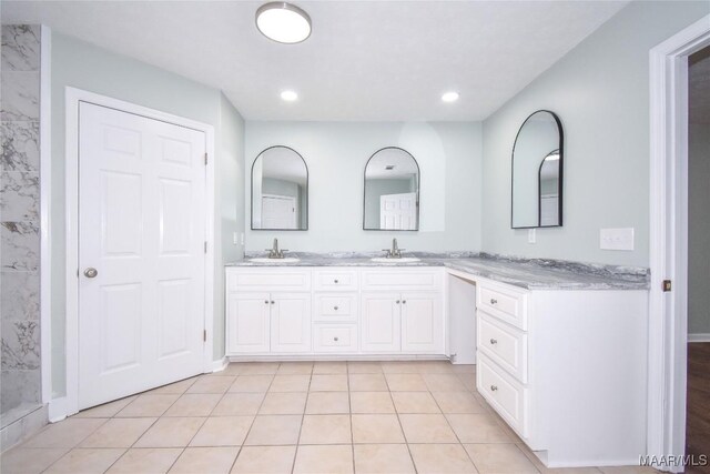 6790 Upper River Rd, Tallassee, AL 36078 - full bathroom with double vanity, tile patterned floors, and recessed lighting