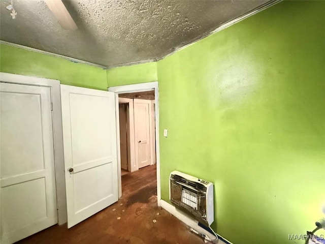 2121 Lauderdale St, Selma, AL 36701 - unfurnished bedroom featuring heating unit, a textured ceiling, and ornamental molding