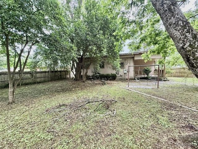 2121 Lauderdale St, Selma, AL 36701 - fenced backyard with a deck