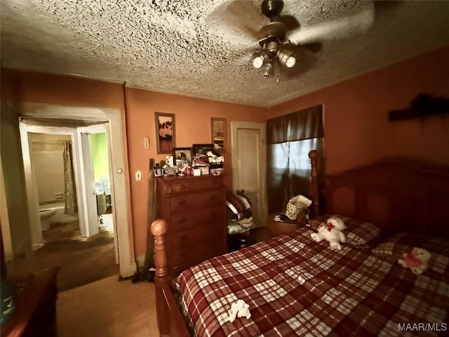 2121 Lauderdale St, Selma, AL 36701 - bedroom with a textured ceiling and ceiling fan