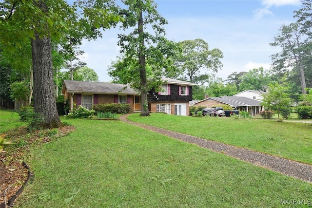 split level home featuring a front yard