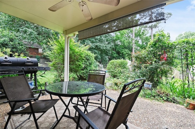 view of patio / terrace with ceiling fan and outdoor dining area