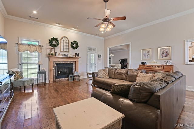 65 Copper Ridge Ct, Deatsville, AL 36022 - living room featuring a ceiling fan, dark wood-type flooring, a premium fireplace, and ornamental molding