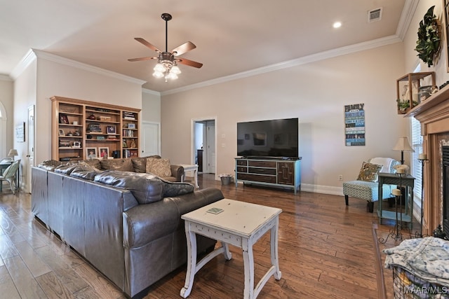 65 Copper Ridge Ct, Deatsville, AL 36022 - living area featuring a ceiling fan, crown molding, wood finished floors, and a fireplace