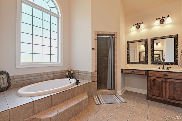 65 Copper Ridge Ct, Deatsville, AL 36022 - bathroom with a bath, a shower stall, vanity, and tile patterned floors