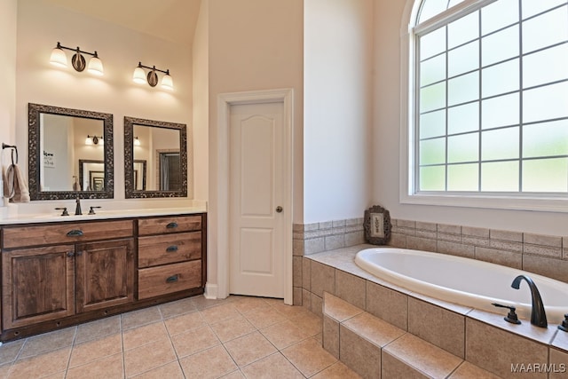 65 Copper Ridge Ct, Deatsville, AL 36022 - bathroom with a bath, vanity, and tile patterned flooring
