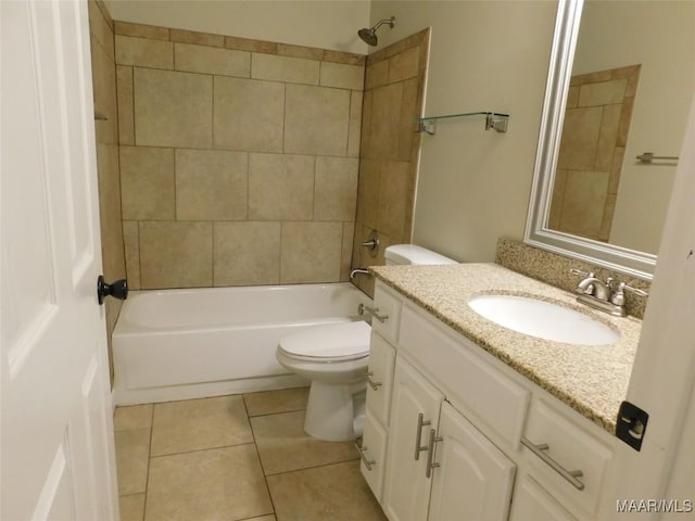 full bath featuring toilet, tile patterned flooring, vanity, and shower / bathtub combination