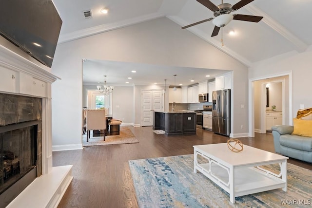 living room with a ceiling fan, high vaulted ceiling, a fireplace with raised hearth, dark wood-style floors, and baseboards