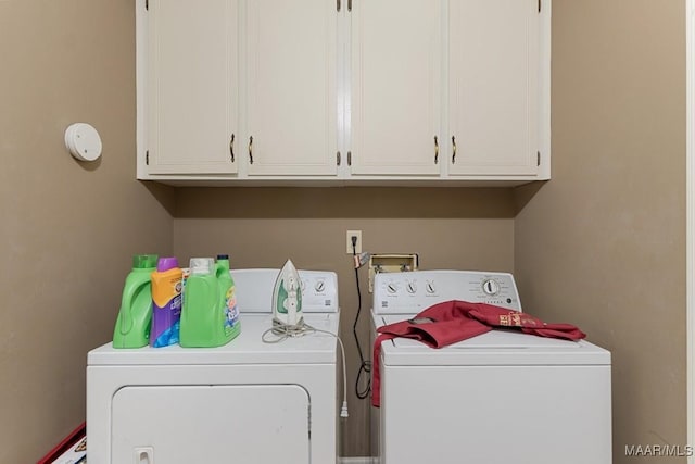 laundry room with separate washer and dryer