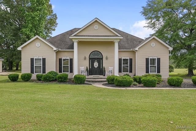 231 Chesson Ct, Fitzpatrick, AL 36029 - neoclassical / greek revival house with a shingled roof and a front yard