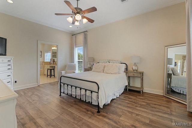 231 Chesson Ct, Fitzpatrick, AL 36029 - bedroom with crown molding, wood finished floors, recessed lighting, baseboards, and ceiling fan