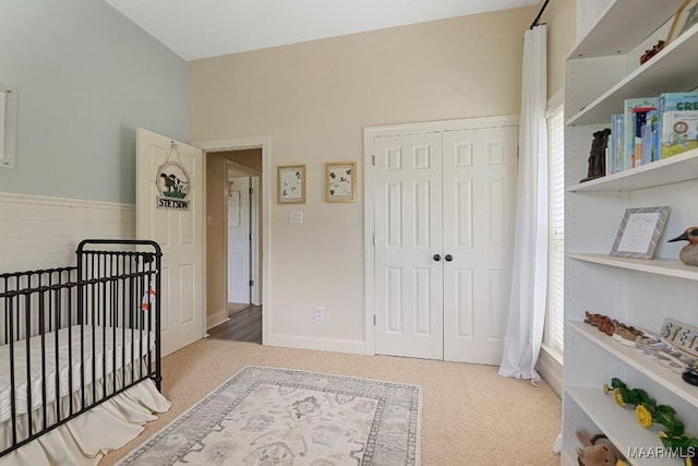 231 Chesson Ct, Fitzpatrick, AL 36029 - bedroom with carpet floors, a closet, and a crib