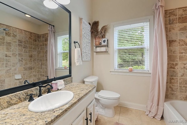 231 Chesson Ct, Fitzpatrick, AL 36029 - bathroom with plenty of natural light, tile patterned flooring, vanity, and toilet