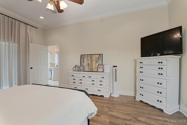 231 Chesson Ct, Fitzpatrick, AL 36029 - bedroom with ornamental molding, wood finished floors, baseboards, recessed lighting, and a chandelier