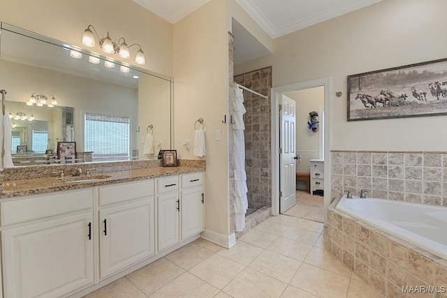 231 Chesson Ct, Fitzpatrick, AL 36029 - full bath with tile patterned flooring, a shower stall, ornamental molding, a garden tub, and vanity