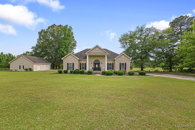 231 Chesson Ct, Fitzpatrick, AL 36029 - view of front of home featuring a front yard and a garage