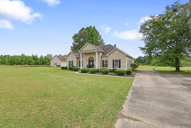231 Chesson Ct, Fitzpatrick, AL 36029 - view of front facade with a front yard and driveway