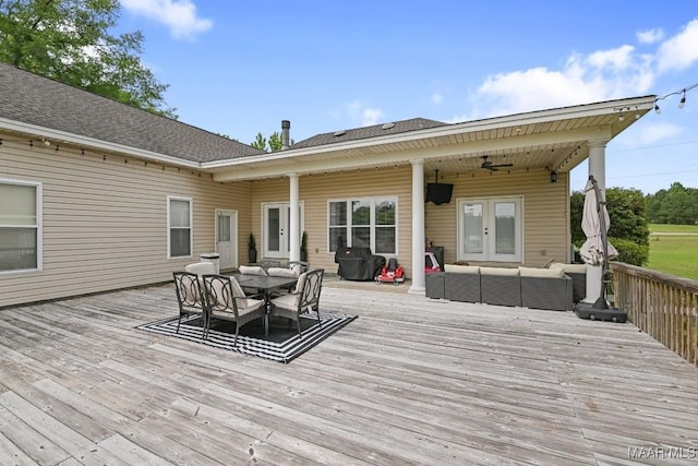 231 Chesson Ct, Fitzpatrick, AL 36029 - deck with an outdoor living space, outdoor dining space, french doors, and a ceiling fan