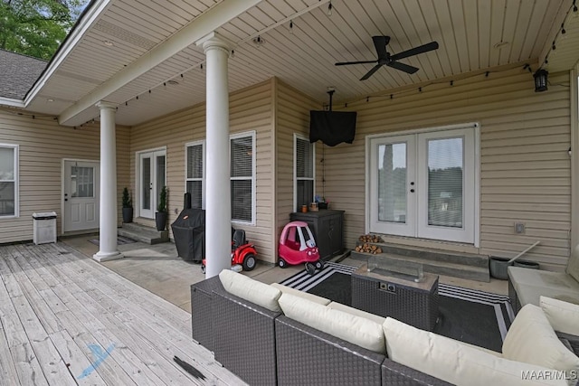 231 Chesson Ct, Fitzpatrick, AL 36029 - view of patio / terrace featuring entry steps, french doors, an outdoor living space, a deck, and a ceiling fan