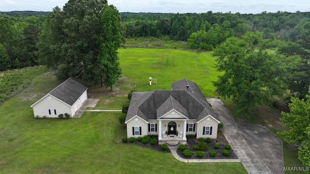 231 Chesson Ct, Fitzpatrick, AL 36029 - aerial view of property and surrounding area with a heavily wooded area