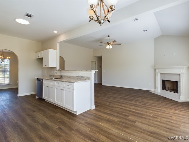 2045 Dawsons Mill Ln, Prattville, AL 36067 - kitchen with a chandelier, a sink, open floor plan, a tiled fireplace, and dishwasher