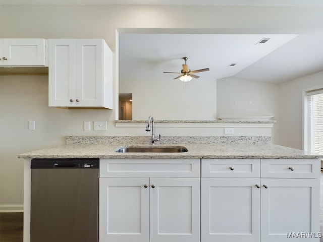2045 Dawsons Mill Ln, Prattville, AL 36067 - kitchen featuring dishwasher, a sink, white cabinets, ceiling fan, and vaulted ceiling