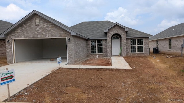 2045 Dawsons Mill Ln, Prattville, AL 36067 - ranch-style home featuring brick siding, a garage, concrete driveway, and a shingled roof