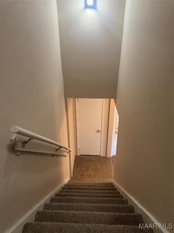 5915 Singleton St, Montgomery, AL 36116 - staircase with carpet flooring
