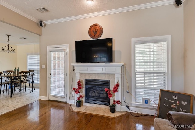 705 Coleman Way, Prattville, AL 36067 - living room with wood finished floors, crown molding, a fireplace, and baseboards