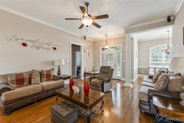 705 Coleman Way, Prattville, AL 36067 - living area with ornate columns, wood finished floors, a ceiling fan, baseboards, and a textured ceiling