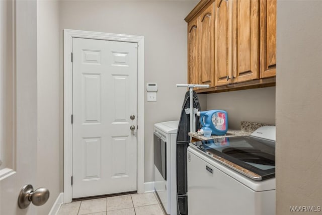 705 Coleman Way, Prattville, AL 36067 - laundry area featuring washer and dryer, light tile patterned flooring, cabinet space, and baseboards