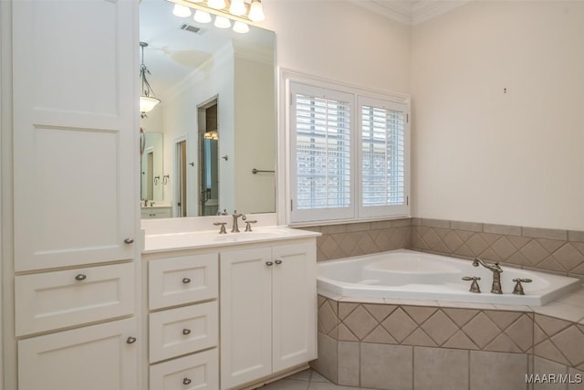 3412 Oak Grove Cir, Montgomery, AL 36116 - full bathroom featuring crown molding, a garden tub, and vanity