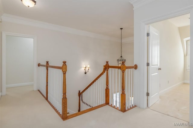 3412 Oak Grove Cir, Montgomery, AL 36116 - corridor featuring an upstairs landing, carpet, ornamental molding, and baseboards