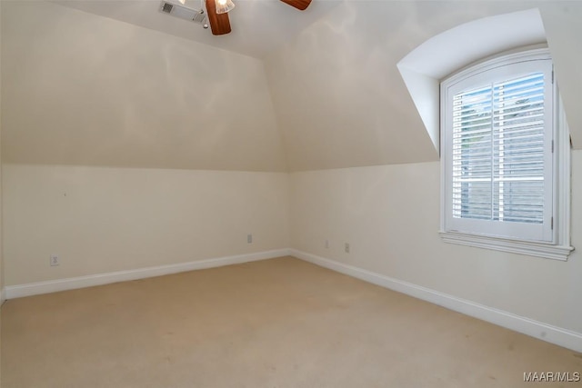 3412 Oak Grove Cir, Montgomery, AL 36116 - additional living space with ceiling fan, light colored carpet, vaulted ceiling, and baseboards
