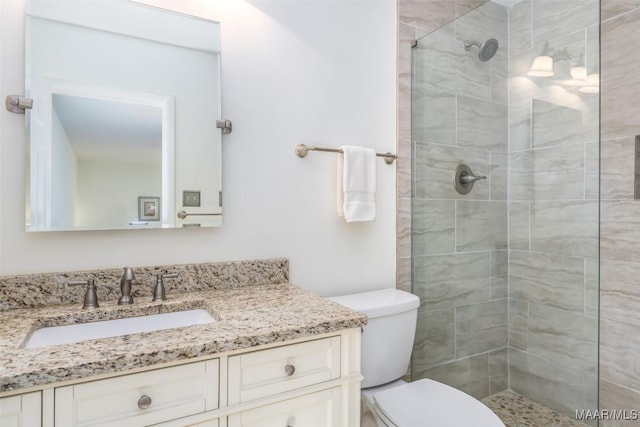 3469 Warrenton Rd, Montgomery, AL 36111 - full bathroom with a stall shower, vanity, and toilet
