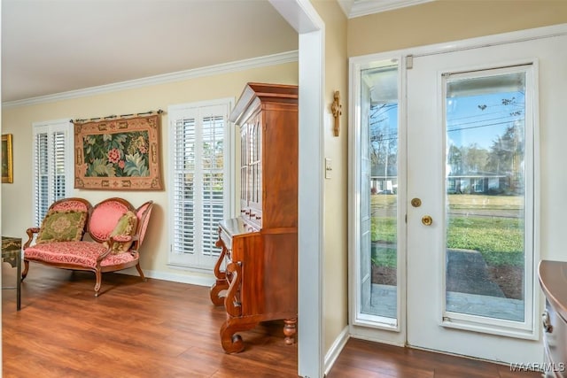 3469 Warrenton Rd, Montgomery, AL 36111 - doorway to outside featuring ornamental molding, wood finished floors, and baseboards