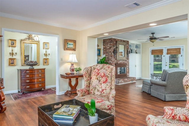 3469 Warrenton Rd, Montgomery, AL 36111 - living room with wood finished floors, baseboards, a brick fireplace, ceiling fan, and ornamental molding