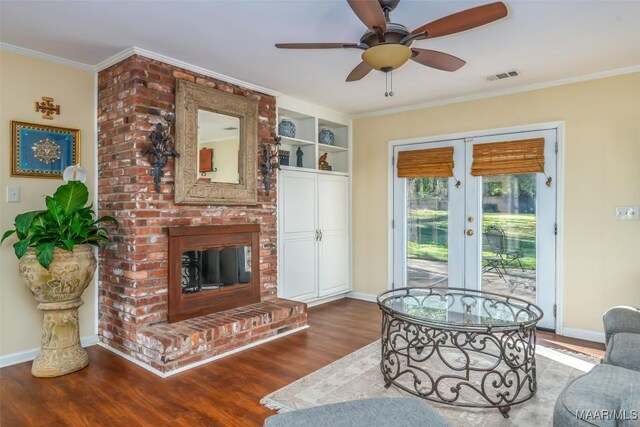 3469 Warrenton Rd, Montgomery, AL 36111 - living room with french doors, wood finished floors, baseboards, and ornamental molding