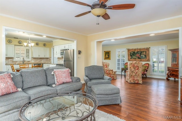3469 Warrenton Rd, Montgomery, AL 36111 - living area with plenty of natural light, crown molding, dark wood-style floors, ceiling fan, and baseboards