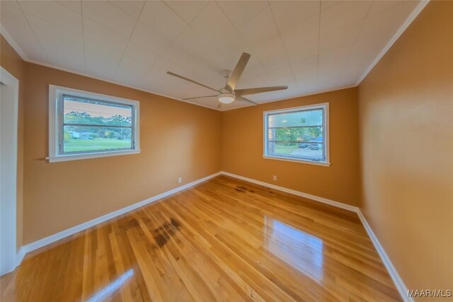 362 Bellehurst Dr, Montgomery, AL 36109 - unfurnished room featuring a ceiling fan, healthy amount of natural light, light wood-type flooring, and crown molding