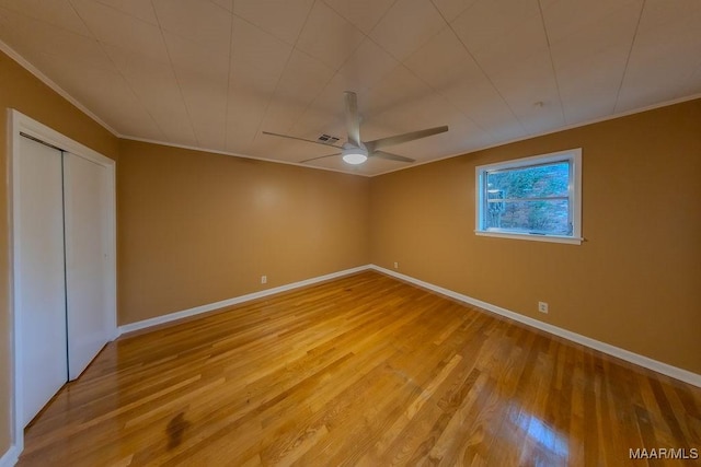 362 Bellehurst Dr, Montgomery, AL 36109 - unfurnished bedroom with light wood-style flooring, crown molding, a closet, and a ceiling fan