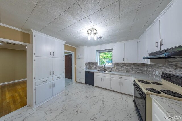 362 Bellehurst Dr, Montgomery, AL 36109 - kitchen with range with electric stovetop, light countertops, black dishwasher, under cabinet range hood, and decorative backsplash